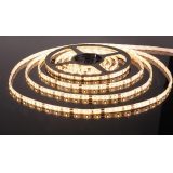 Светодиодная лента 3528/60 LED 4.8W IP65 [белая подложка] теплый белый свет
